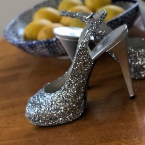 Stuart weitzman Glitter silver peep toe pumps